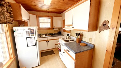 Stunning Waterfront Cabin with Fire Pit, Porch and Deck in Maine - Greenville, Maine - glamping.directory