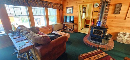 Stunning Waterfront Cabin with Fire Pit, Porch and Deck in Maine - Greenville, Maine - glamping.directory