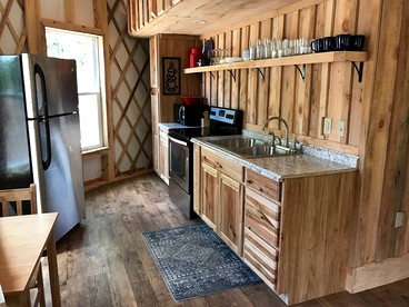 Sunny Yurt Rental with a Beautiful Interior on the New River in Virginia - Rich Creek, Virginia - glamping.directory