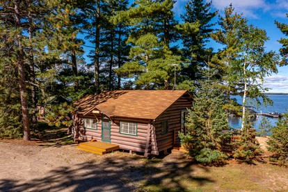 Cozy Lakeside Cabin with Scenic Views & Spacious Deck in Orr, Minnesota - glamping.directory