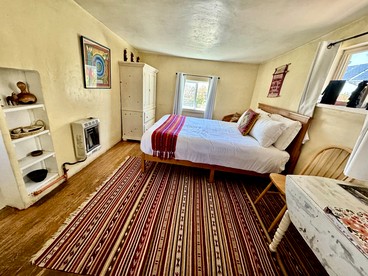 Charming Log Cabin Rental on Eco-Farm near Taos Ski Valley - Taos Ski Valley, New Mexico - glamping.directory