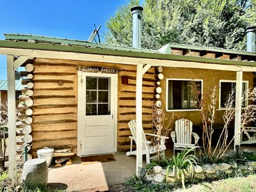 Charming Log Cabin Rental on Eco-Farm near Taos Ski Valley - Taos Ski Valley, New Mexico - glamping.directory
