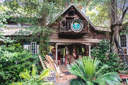 Eclectic Riverfront Log Cabin and Artist Retreat for Groups in Castle Hayne, North Carolina - glamping.directory