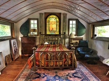 Eclectic Riverfront Log Cabin and Artist Retreat for Groups in Castle Hayne, North Carolina - Castle Hayne, North Carolina - glamping.directory