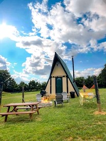 Secluded A-Frame Glamping on 46-Acre Farm Near Nashville – Queen Beds, Fire Pit, Breakfast Included - glamping.directory