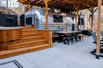 Retro Camper Retreat with Firepit & Hot Tub Escape in Sevierville, Tennessee - glamping.directory