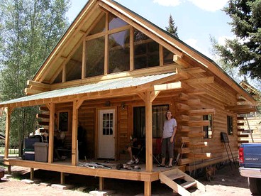 Family-Friendly Log Cabin Rental with a Private Porch near Gunnison, Colorado - glamping.directory