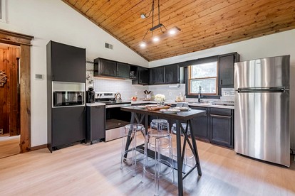 Riverfront Cabin with Pool Table, Fire Pit and Plenty of Outdoor Space in Hedgesville, West Virginia - Hedgesville, West Virginia - glamping.directory