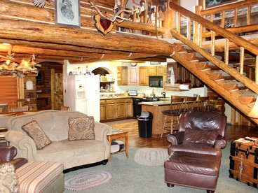 Authentic Cabin Rental with Hot Tub and Mountain Views in Columbia Falls, Montana - Columbia Falls, Montana - glamping.directory