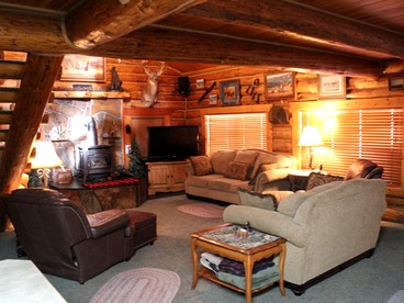 Authentic Cabin Rental with Hot Tub and Mountain Views in Columbia Falls, Montana - Columbia Falls, Montana - glamping.directory