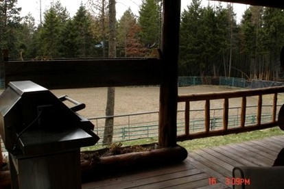 Authentic Cabin Rental with Hot Tub and Mountain Views in Columbia Falls, Montana - Columbia Falls, Montana - glamping.directory