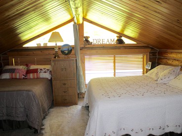 Authentic Cabin Rental with Hot Tub and Mountain Views in Columbia Falls, Montana - Columbia Falls, Montana - glamping.directory