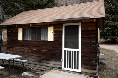 Simple Country Cabin with Ornate Wood Stove in the Colorado Mountains of Poudre Canyon - glamping.directory