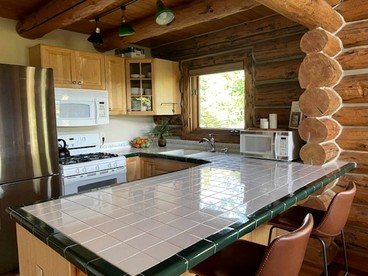 Gorgeous Log Cabin with Breathtaking Mountain Views for an Unforgettable Escape in Mountain Village, Colorado - Mountain Village, Colorado - glamping.directory