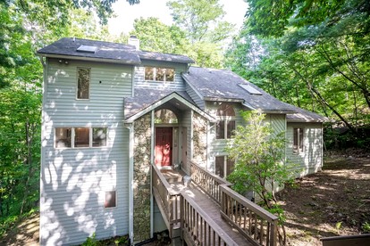 Cozy Sunny Bear Mountain Retreat with Floor-to-Ceiling Stone Fireplace Near Wintergreen Resort in VA - glamping.directory
