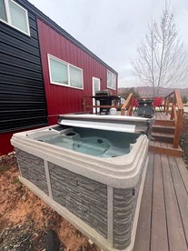 Chill Out in Style: Tiny Home Paradise with Hot Tub in Apple Valley - Apple Valley, Utah - glamping.directory