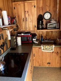 Dog-Friendly Lakeside Cabin Rental with Private Beach in Brownfield, Maine - Brownfield, Maine - glamping.directory