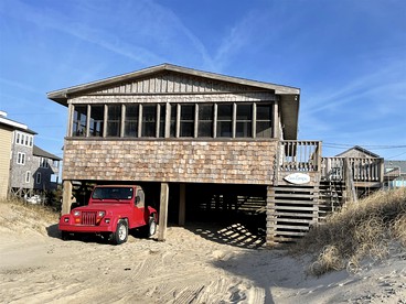 Heavenly Cottage with Screened Porch and Sea Views in Buxton, North Carolina - glamping.directory