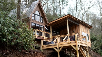Romantic Riverfront Cabin with Pool Access in Blue Ridge, Georgia - glamping.directory