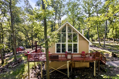 Updated Chalet-Cabin with Hot Tub, Fire Pit, Resort Amenities Surrounded by Amazing Views - the Perfect Getaway for Your Group in Hedgesville, WV - glamping.directory
