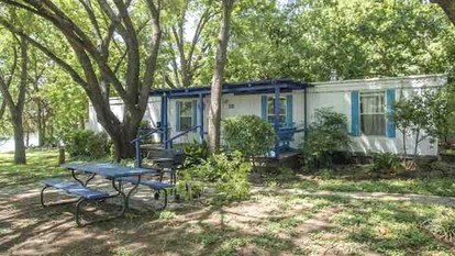 Comfortable Cabin Rental with Lakeside Views near Austin - Kingsland, Texas - glamping.directory