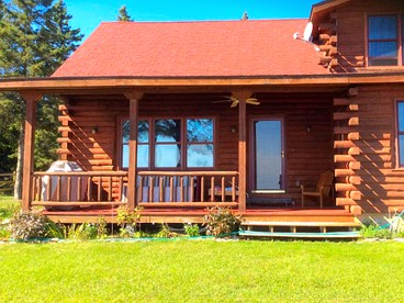 Fantastic Lakeside Log Cabin Rental for Six in Cedar River, Michigan - glamping.directory