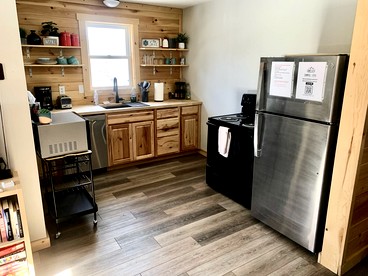 Secluded Rustic Cabin with Hot Tub Near Pere Marquette River in Big Rapids, Michigan - Big Rapids, Michigan - glamping.directory