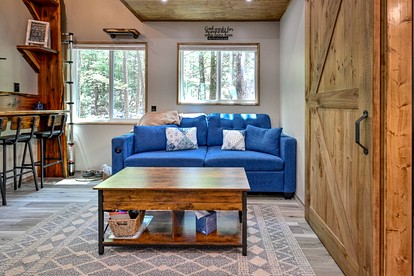 Cozy Tiny Cabin with Porch & Fire Pit near Scenic Trails in Western Arkansas - Boles, Arkansas - glamping.directory