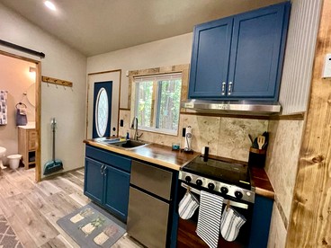 Cozy Tiny Cabin with Porch & Fire Pit near Scenic Trails in Western Arkansas - Boles, Arkansas - glamping.directory