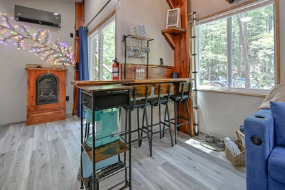 Cozy Tiny Cabin with Porch & Fire Pit near Scenic Trails in Western Arkansas - Boles, Arkansas - glamping.directory
