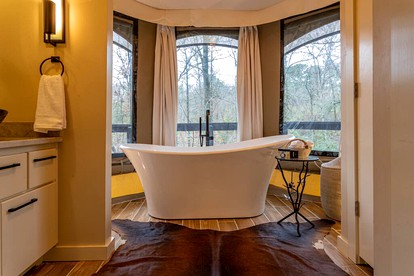 Serenity for Friends: Luxe Tented Cabin and Hot Tub Delight in Hot Springs, AR - Hot Springs National Park, Arkansas - glamping.directory