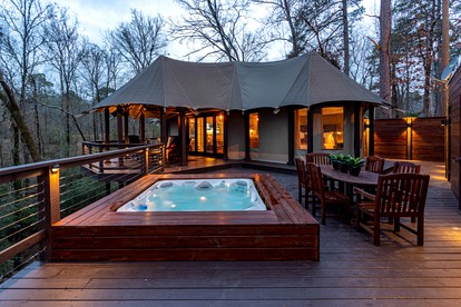 Serenity for Friends: Luxe Tented Cabin and Hot Tub Delight in Hot Springs, AR - glamping.directory