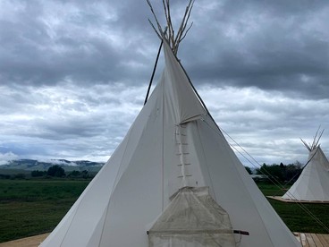 Rustic Elegance: Tipi Glamping by Wind River Mountains in Fort Washakie - Fort Washakie, Wyoming - glamping.directory