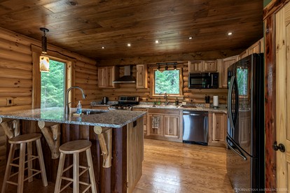 Experience Hilltop Privacy in a Luxury Log Home with Epic Mountain Views in Lake Placid, NY - Lake Placid, New York - glamping.directory
