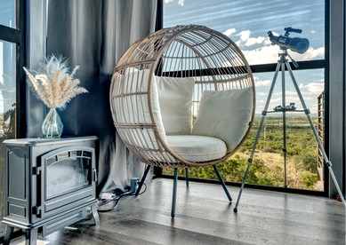 Stunning Mirror-Glass Retreat with Spa Tub & Sunset Deck in Cottonwood, Texas - Cottonwood Shores, Texas - glamping.directory