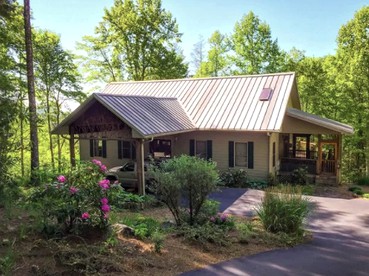 Stunning Cabin Surrounded by Waterfalls near Sapphire, North Carolina - glamping.directory