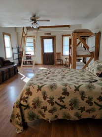 Comfortable Camping Cabins with View of the Cedar River for a Family Weekend Getaway - Letts, Iowa - glamping.directory