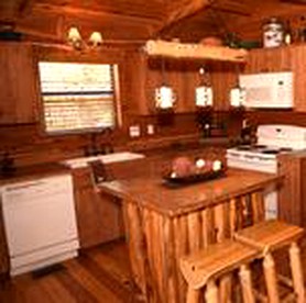 Charming Log Cabin Perfect for a Summer Staycation in Texas Hill Country - Canyon Lake, Texas - glamping.directory