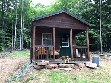 Log Cabin for Family Glamping Vacation near Cherry Springs State Park, Pennsylvania - Galeton, Pennsylvania - glamping.directory