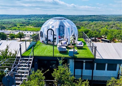 Luxury Glass A-Frame Escape with Cliffside Balcony & Spa Features in Cottonwood Shores, Texas - Cottonwood Shores, Texas - glamping.directory