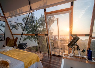 Luxury Glass A-Frame Escape with Cliffside Balcony & Spa Features in Cottonwood Shores, Texas - Cottonwood Shores, Texas - glamping.directory