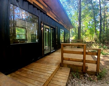 Secluded Container with BBQ for a Waterfront Retreat, Perfect for Fishing and Roasting S'Mores in Grimes County, Texas - Grimes County, Texas - glamping.directory