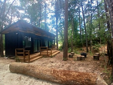 Secluded Container with BBQ for a Waterfront Retreat, Perfect for Fishing and Roasting S'Mores in Grimes County, Texas - glamping.directory
