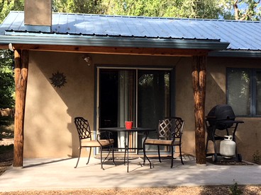Charming Cabin Retreat: Fireplace and River Views in San Miguel County, NM - San Miguel County, New Mexico - glamping.directory