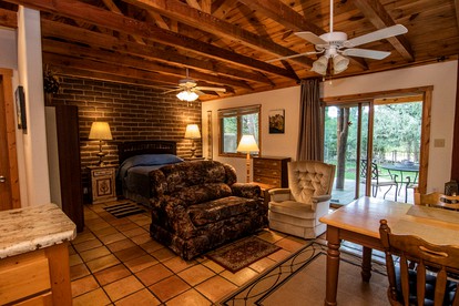 Charming Cabin Retreat: Fireplace and River Views in San Miguel County, NM - San Miguel County, New Mexico - glamping.directory