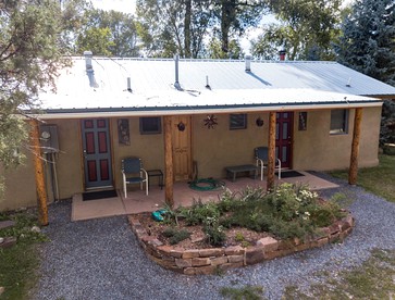 Charming Cabin Retreat: Fireplace and River Views in San Miguel County, NM - glamping.directory