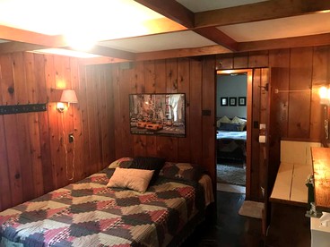 Wonderful Cabin with Lake Access, Barbecue and Tennis Court in Carp Lake, Michigan - Carp Lake, Michigan - glamping.directory