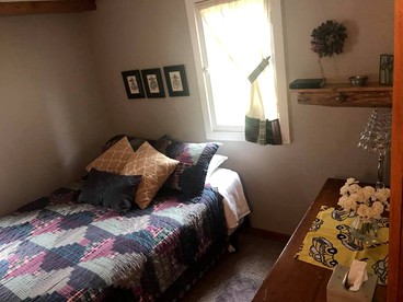 Wonderful Cabin with Lake Access, Barbecue and Tennis Court in Carp Lake, Michigan - Carp Lake, Michigan - glamping.directory