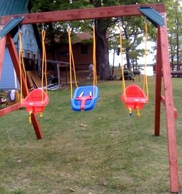 Wonderful Cabin with Lake Access, Barbecue and Tennis Court in Carp Lake, Michigan - Carp Lake, Michigan - glamping.directory