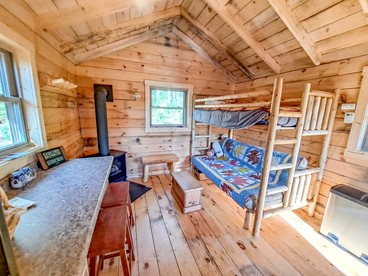 Cozy Tiny Cabin - Off-Grid Experience with Sled Dogs Year 'round in Minnesota - Grand Marais, Minnesota - glamping.directory